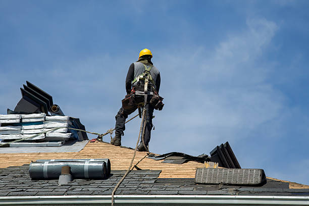 Professional Gutter Installation technician working in Roxbury Crossing, MA